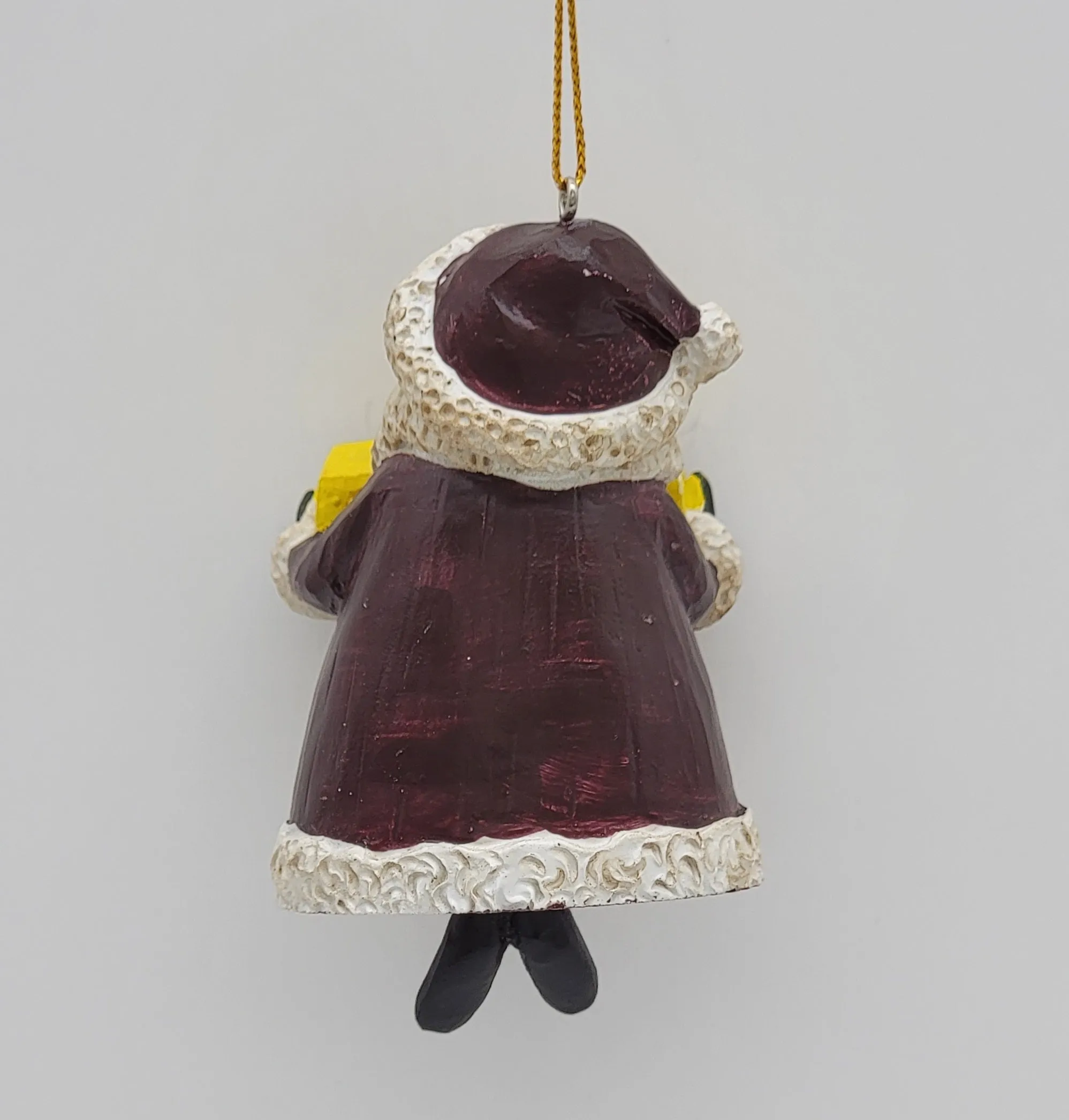 Santa holding a Yellow Cap NYC Taxi Christmas ornament